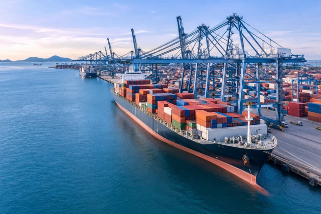 Container ship and port cranes